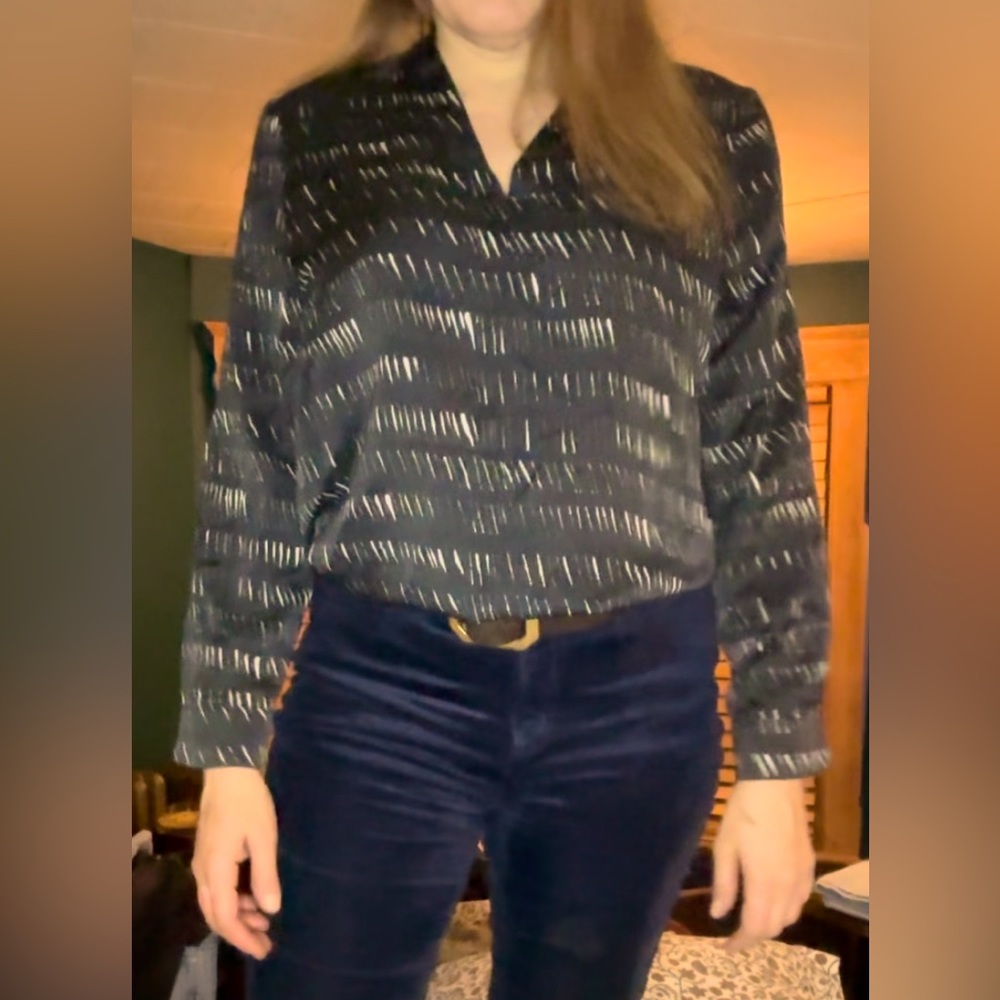 Flattering silk blouse never worn.